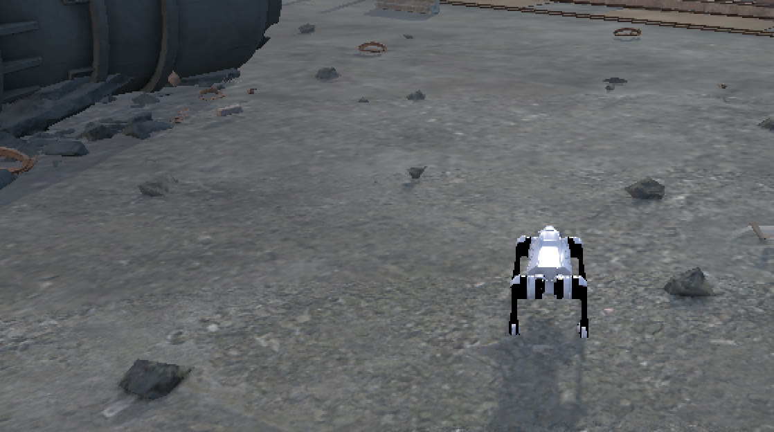 A quadruped robot walking over rubble in an industrial yard